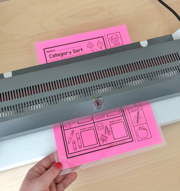 Laminate and Cut Astrobrights For Classroom Organization